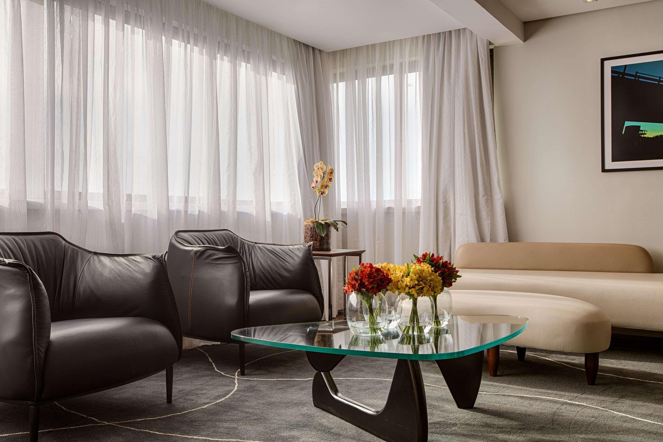 Art Hotel Transamerica Collection Porto Alegre Exterior foto A living room at the hotel